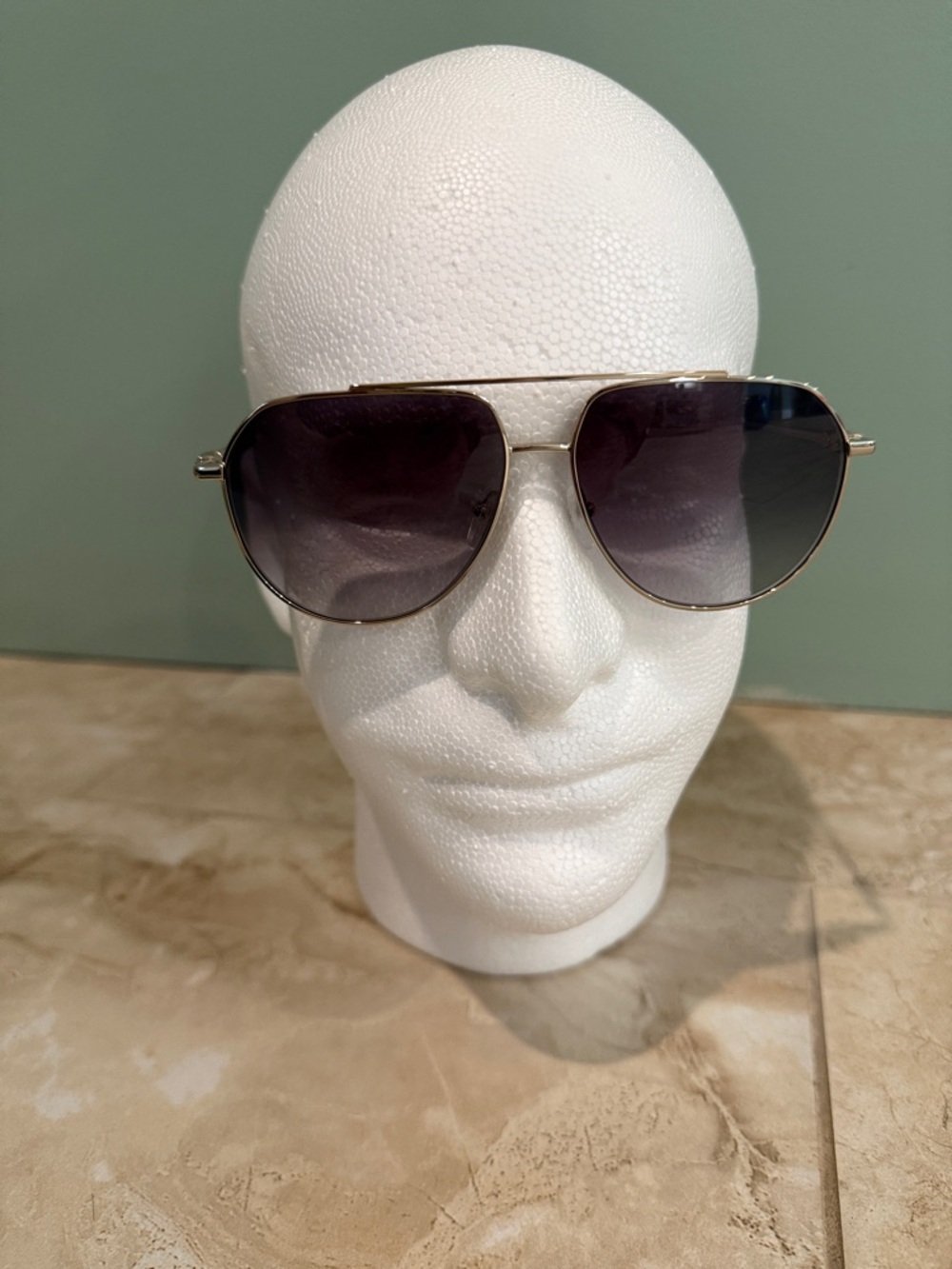 Longchamp Silver Frame Aviator Sunglasses with Gradient Gray Lenses
